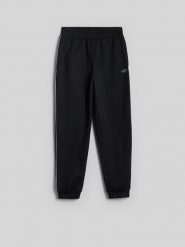 4F Spodnie sportowe joggery szybkoschnące dziewczęce - czarne 134/140 (8-10 lat). Czarne spodnie sportowe dla dziewczynek 4f, bez wzorów, na fitness i siłownię. Za 129.99 zł.
