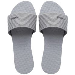 Klapki Havaianas Model 4147312 Kolor Szary. Szare klapki damskie Havaianas, bez wzorów, sportowe, bez obcasa. Za 179.99 zł.