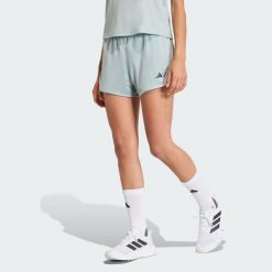 Szorty Pacer Essentials Knit High-Rise. Białe obuwie sportowe damskie Adidas, bez wzorów, z materiału, na fitness i siłownię. Za 129.00 zł.