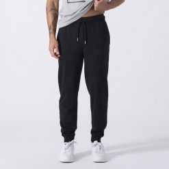 Ikoniczne Spodnie Z Mankiecikiem Czarny Bawelna, Poliester. Czarne spodnie materiałowe męskie Everlast, m, bez wzorów, z bawełny. Za 194.60 zł.