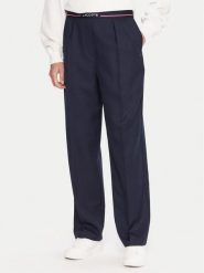 Lacoste Spodnie materiałowe HF5307 Granatowy Relaxed Fit. Niebieskie spodnie materiałowe damskie Lacoste, bez wzorów, z materiału. Za 829.99 zł.