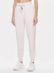 Guess Spodnie dresowe Logo W4RB46 KBYE2 Różowy Regular Fit. Czerwone spodnie dresowe damskie Guess, xxl, z aplikacjami, z dresówki. Za 269.99 zł.
