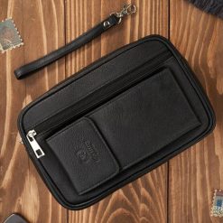 Saszetka męska skórzana do ręki z miejscem na telefon czarna Paolo Peruzzi T-132-BL. Czarne saszetki męskie z materiału, eleganckie. Za 119.00 zł.