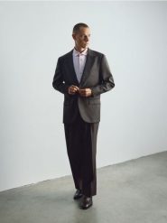 Wełniana marynarka slim fit - brązowy. Brązowe marynarki męskie Reserved, bez wzorów, z wełny. Za 599.99 zł.