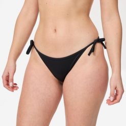Dół kostiumu kąpielowego surfingowego damski Olaian Sofy. Czarne bikini damskie OLAIAN, xs, bez wzorów. Za 19.99 zł.