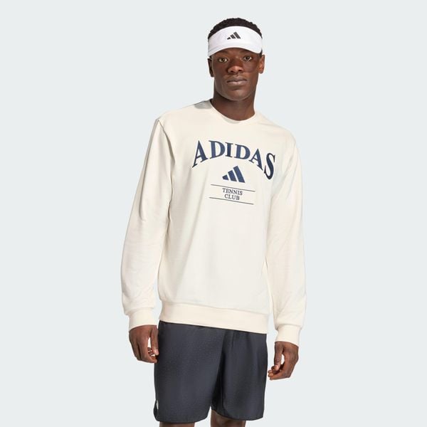 Bluza adidas Heritage Graphic Crew. Białe bluzy męskie Adidas, l, bez wzorów, z bawełny, bez kaptura. Za 341.85 zł.