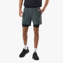 Szorty treningowe Trening Męska Swedemount Core 2-In-1 Shorts szybkoschnące. Niebieskie krótkie spodenki sportowe męskie SWEDEMOUNT, m, bez wzorów, z materiału, do biegania. Za 166.00 zł.