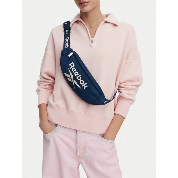Torebka Reebok. Niebieskie torebki do ręki damskie Reebok, bez wzorów, młodzieżowe, bez dodatków. Za 49.99 zł.