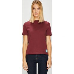 Calvin Klein Jeans - Top. Szare topy damskie Calvin Klein Jeans, z bawełny, z okrągłym kołnierzem, z krótkim rękawem. Za 159.90 zł.