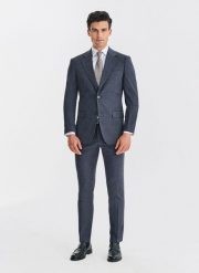 Granatowy garnitur męski. Niebieskie garnitury męskie Pako Lorente, bez wzorów, z elastanu, biznesowe. Za 1,099.98 zł.