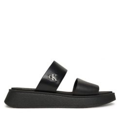 Klapki Calvin Klein Jeans. Czarne klapki damskie Calvin Klein Jeans, bez wzorów, z jeansu, bez obcasa. Za 219.99 zł.