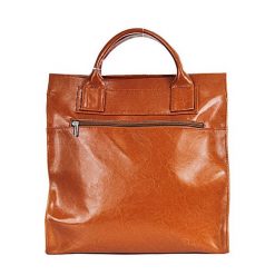 Teczka skórzana damska DAN-A T233 camel. Brązowe torebki do ręki damskie DAN-A, bez wzorów, ze skóry, eleganckie, bez dodatków. Za 399.99 zł.