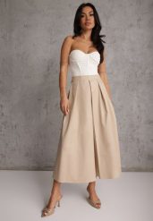 Beżowa Bawełniana Spódnica o Rozkloszowanym Kroju z Plisami Nerimara. Brązowe spódnice damskie Renee, l, z aplikacjami, z bawełny, midi, plisowane. Za 119.99 zł.