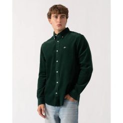 Aksamitna koszula z długim rękawem Gant. Zielone koszule męskie GANT, xl, z aplikacjami, z bawełny, eleganckie, bez kołnierzyka, bez ramiączek. Za 534.50 zł.
