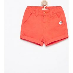 Krótkie spodenki - Pomarańczo. Spodenki niemowlęce marki 4F JUNIOR. W wyprzedaży za 19.99 zł.