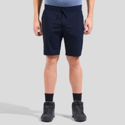 Spodenki męskie ODLO Essential Short. Niebieskie krótkie spodenki sportowe męskie Odlo, m, bez wzorów, z materiału, trekkingowe. Za 321.00 zł.