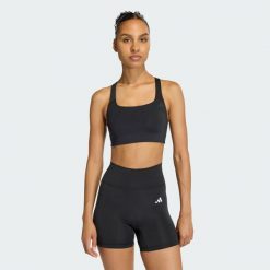Biustonosz Optime Workout ze średnim wsparciem. Czarne obuwie sportowe damskie Adidas, bez wzorów, na fitness i siłownię. Za 199.00 zł.