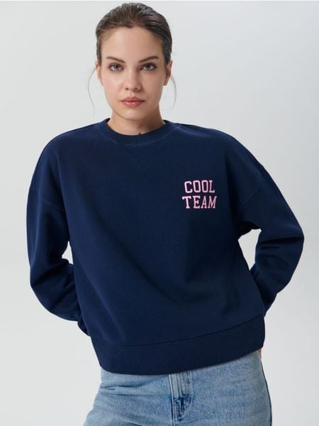 Bluza z nadrukiem - granatowy. Niebieskie bluzy damskie Sinsay, l, bez wzorów, z bawełny, bez kaptura. Za 49.99 zł.