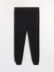 Strukturalne spodnie regular fit - czarny. Czarne spodnie materiałowe męskie Sinsay, l, bez wzorów. Za 69.99 zł.