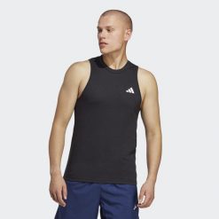 Train Essentials Feelready Training Sleeveless Tee. Białe buty sportowe męskie Adidas, z materiału, bez zapięcia, na fitness i siłownię. Za 97.15 zł.