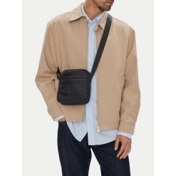 Saszetka GINO ROSSI. Czarne saszetki męskie Gino Rossi, młodzieżowe, małe. Za 99.99 zł.