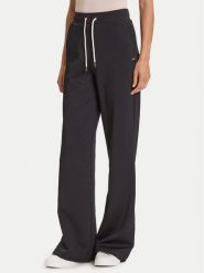 Guess Spodnie dresowe V5YB19 KBSL2 Czarny Regular Fit. Czarne spodnie dresowe damskie Guess, xxs, z aplikacjami, z dresówki. Za 259.99 zł.