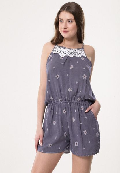 Granatowy Kombinezon Hush. Niebieskie sukienki damskie Born2be, na lato, w ażurowe wzory, z koronki, bez kołnierzyka, bez ramiączek, mini. Za 29.99 zł.