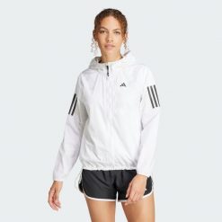 Kurtka Own The Run. Białe kurtki damskie Adidas, xs, bez wzorów, z materiału, bez kaptura. Za 318.25 zł.