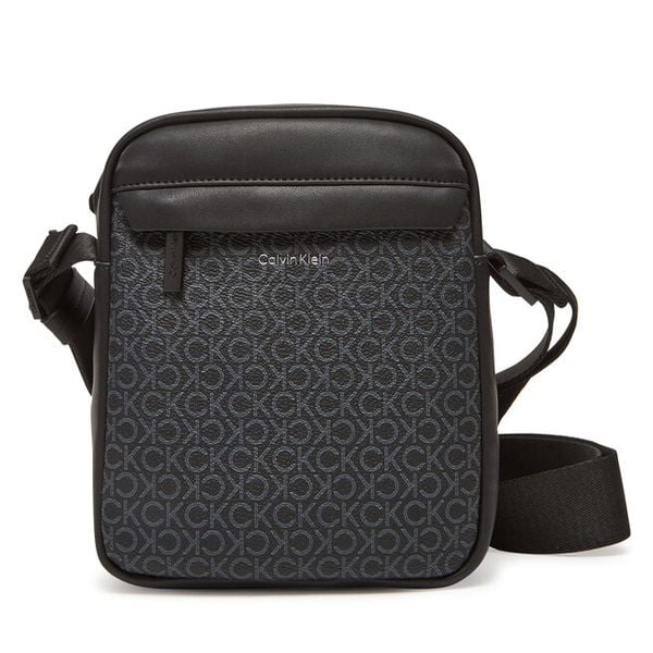 Saszetka Calvin Klein. Czarne saszetki męskie Calvin Klein, młodzieżowe, małe. Za 259.99 zł.