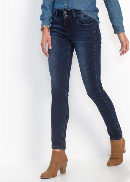 Modelujące dżinsy ze stretchem o kroju slim fit. Niebieskie jeansy damskie bonprix. Za 169.99 zł.