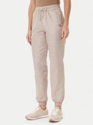 Guess Spodnie dresowe V5YB14 WHFU0 Beżowy Regular Fit. Brązowe spodnie dresowe damskie Guess, l, z aplikacjami, z dresówki. Za 304.00 zł.