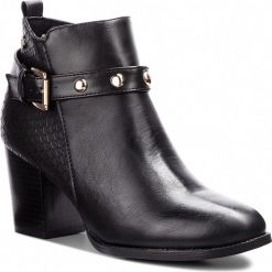 Botki XTI - 48399 Negro. Czarne kozaki damskie Xti, z materiału, bez obcasa, na obcasie. W wyprzedaży za 179.00 zł.
