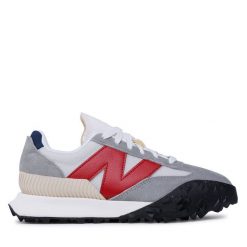 Sneakersy New Balance. Czerwone trampki i tenisówki chłopięce New Balance, bez wzorów, bez zapięcia. Za 189.99 zł.