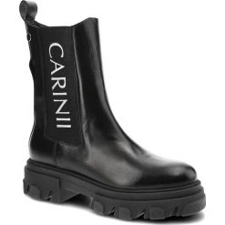 Czarne Botki Carinii Modne Skórzane Sztyblety. Czarne kozaki damskie Carinii, z materiału, bez obcasa, na obcasie. Za 369.00 zł.