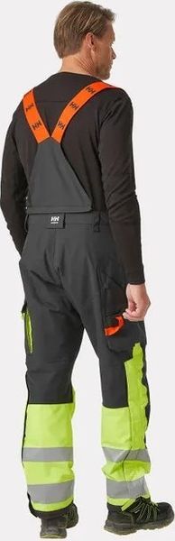 Helly Hansen Winter overalls HELLY HANSEN Alna 2.0, black/yellow C58. Czarne spodnie sportowe męskie Helly Hansen, m, bez wzorów. Za 650.40 zł.