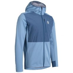 Kurtka narciarska z kapturem Daehlie Sportswear Power. Niebieskie kurtki męskie DAEHLIE, na zimę, m, bez wzorów, sportowe, z kapturem. Za 788.00 zł.