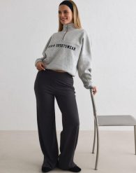 Damskie spodnie ultramiękkie, proste nogawki, wysoki stan Sense jasnoszare. Szare spodnie materiałowe damskie Aim'n, m, bez wzorów, z elastanu, na fitness i siłownię. Za 339.00 zł.