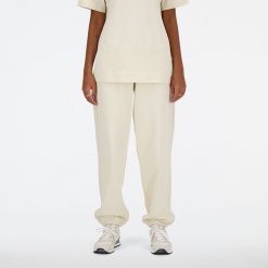 Spodnie damskie New Balance WP41513LIN – beżowe. Brązowe spodnie sportowe damskie New Balance, s, bez wzorów, z bawełny. Za 379.99 zł.
