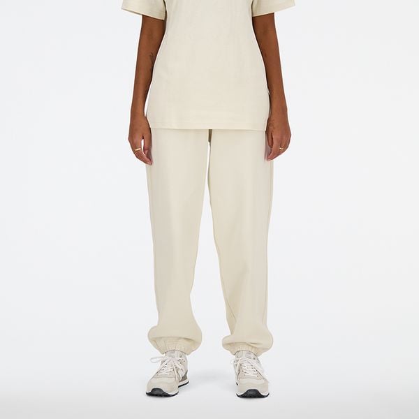 Spodnie damskie New Balance WP41513LIN – beżowe. Brązowe spodnie sportowe damskie New Balance, s, bez wzorów, z bawełny. Za 379.99 zł.