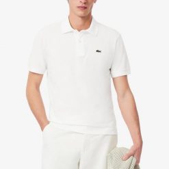 Lacoste Model Short Sleeved Ribbed Collar Kolor Biały. Białe koszulki polo męskie Lacoste, m, bez wzorów, z tkaniny, bez ramiączek. W wyprzedaży za 400.90 zł.