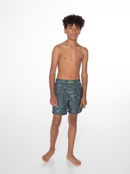 Spodenki chłopięce Protest PRTBRANDO JR beachshort. Niebieskie kąpielówki dla chłopców Protest, na lato, bez wzorów, eleganckie. Za 84.99 zł.