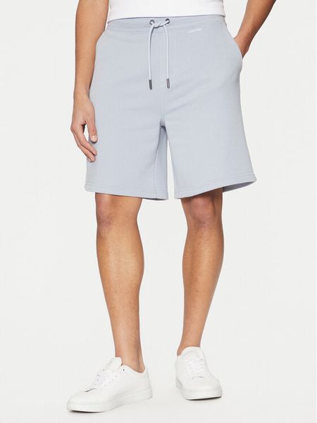 Calvin Klein Szorty sportowe Nano Logo K10K112689 Niebieski Regular Fit. Niebieskie krótkie spodenki sportowe męskie Calvin Klein, l, bez wzorów, z bawełny. Za 209.99 zł.