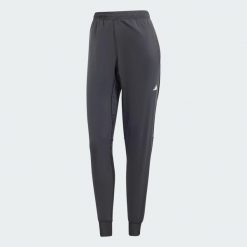 Spodnie Own the Run. Czarne spodnie sportowe damskie Adidas, s, bez wzorów, z materiału, do biegania. Za 240.75 zł.
