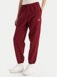 Calvin Klein Jeans Spodnie dresowe Monologo LV047B235G Bordowy Regular Fit. Czerwone spodnie dresowe damskie Calvin Klein Jeans, m, bez wzorów, z bawełny. Za 319.99 zł.