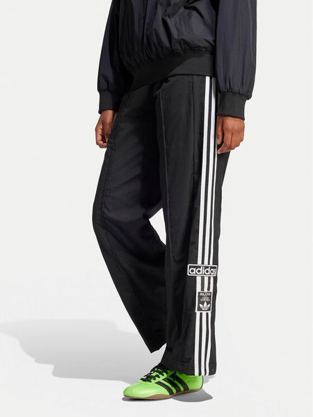 Adidas Spodnie dresowe adicolor Adibreak JD0857 Czarny Loose Fit. Czarne spodnie dresowe damskie Adidas, s, bez wzorów, z dresówki. Za 239.99 zł.