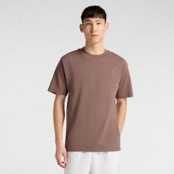 Koszulka męska New Balance MT41533ABP – brązowa. Brązowe koszulki sportowe męskie New Balance, l, bez wzorów, z dresówki, bez kołnierzyka, bez ramiączek. Za 169.99 zł.