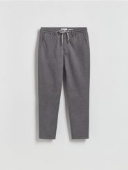 Spodnie carrot z wiązaniem - ciemnoszary. Szare spodnie materiałowe męskie Reserved, l, bez wzorów, z tkaniny. Za 149.99 zł.