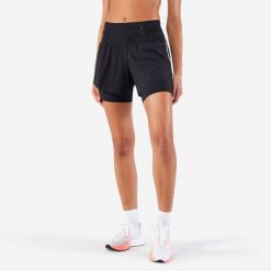 Spodenki do biegania damskie Kiprun 2w1 Run 900 Ultra. Czarne szorty sportowe damskie KIPRUN, s, bez wzorów, z materiału, do biegania. Za 189.99 zł.