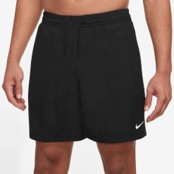 Spodnie Mężczyzna Nike Pantalón Corto Dry Fit czarny. Czarne spodnie sportowe męskie Nike, l, bez wzorów, z materiału, do biegania. Za 323.00 zł.