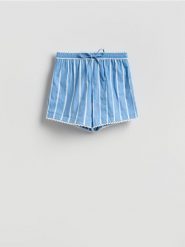 Wzorzyste szorty - jasnoniebieski. Niebieskie szorty damskie Reserved, l, bez wzorów, z bawełny, klasyczne. Za 139.99 zł.